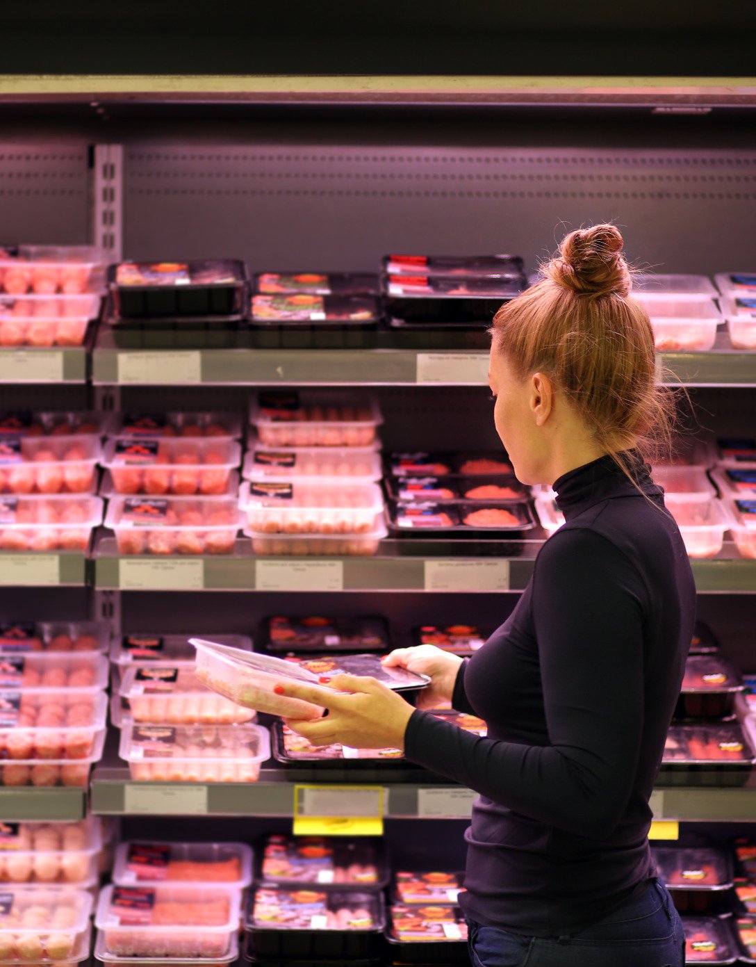 Retail consumer choosing Teys meat